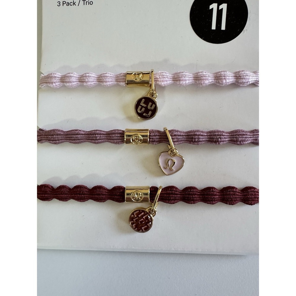 New Lululemon 3 Pack Logo Charm Hair Ties /SBPRC/ROWD/GOLD Detachable Charms - Picture 3 of 5